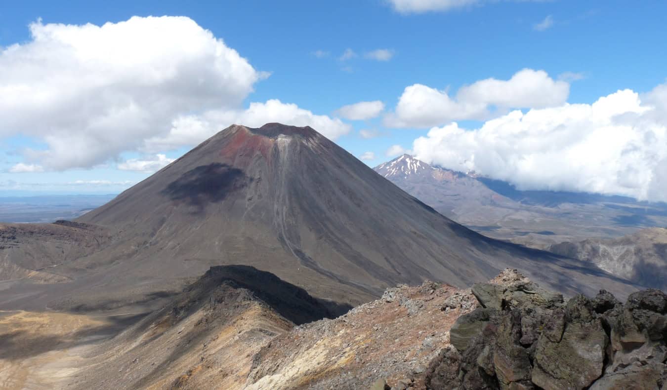 The volcano of Mount Tongariro in New Zealand on a sunny day; it stands in for Mount Doom in the Lord of the Rings movies
